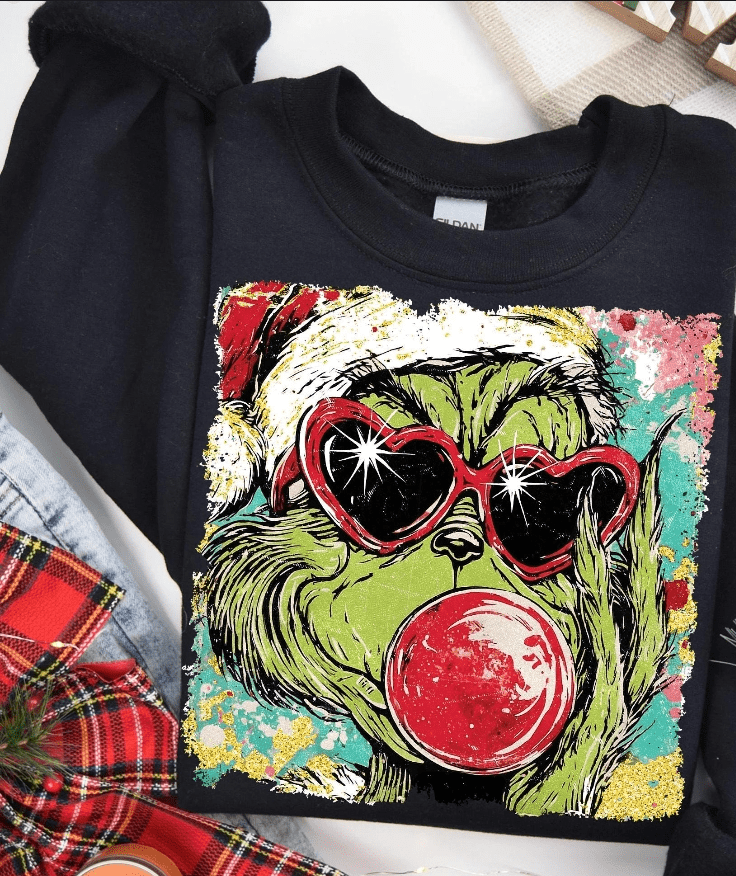 Bubble Gum Grinch Graphic Apparel